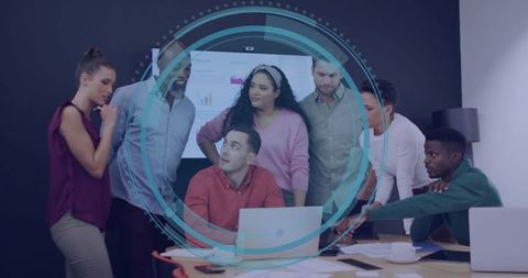 Diverse Business Team Collaborating on Strategy in Modern Office