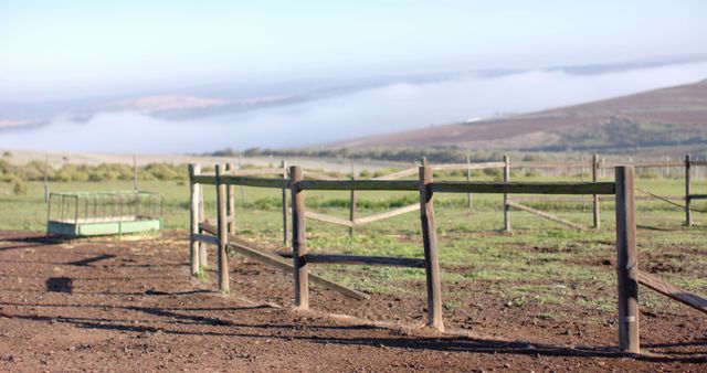 Serene Countryside Fence with Misty Mountain View - Download Free Stock Images Pikwizard.com