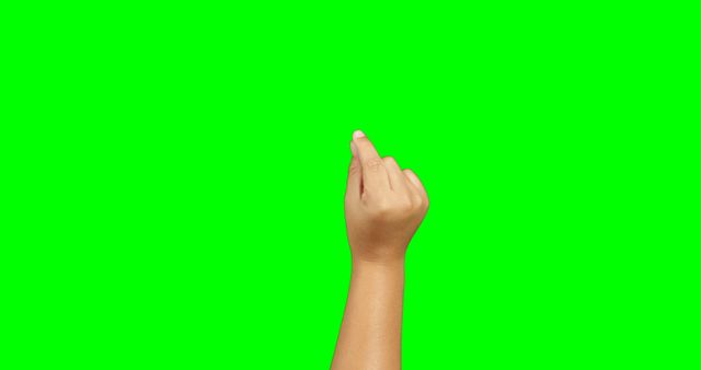 Hand Making Pinching Gesture on Green Background - Download Free Stock Images Pikwizard.com