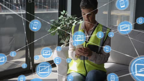 Businesswoman in Office Networking with Digital Interface