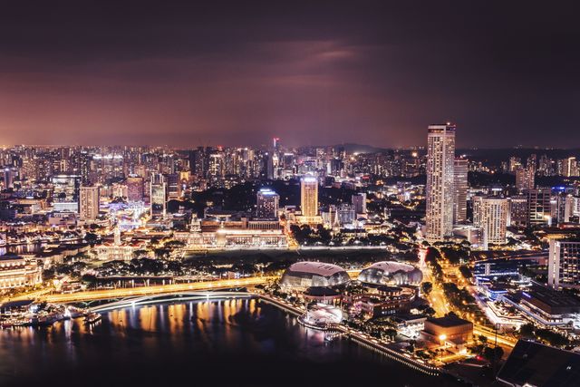 Aerial View of Singapore City Skyline at Night - Download Free Stock Photos Pikwizard.com