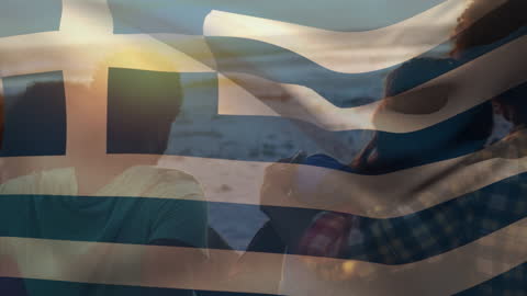 Friends Relaxing on Beach with Waving Greece Flag Overlay