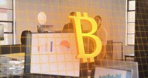 Business team analyzing bitcoin market charts in modern office with yellow grid overlay