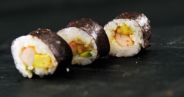 Close-up of Delicious Sushi Rolls with Crab and Avocado on Dark Background - Download Free Stock Images Pikwizard.com