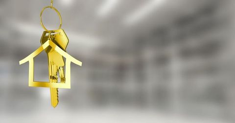 Elegant House-shaped Gold Keychain with Hanging Keys