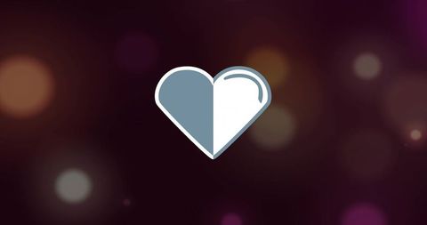 Minimal two-tone heart icon on dark bokeh backdrop featuring glossy blue-gray and white halves