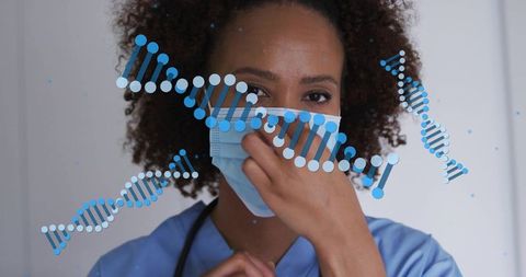 Clinical nurse adjusting mask with dna strands overlay highlighting genomics and ppe