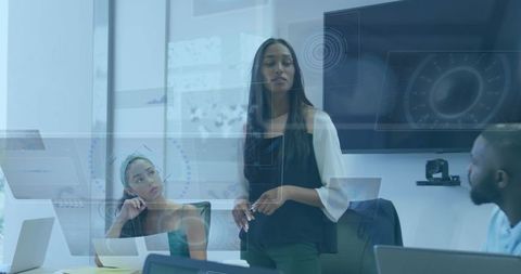 Businesswoman Leading Team Meeting with Innovative Technology