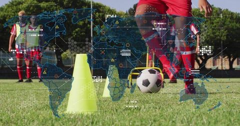 Youth soccer player dribbling through cones with tactical hud overlay during training