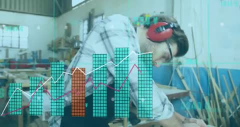 Carpenter Using Sander with Projected Data Graphs in Workshop