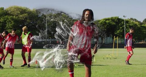 Athletes Practicing Soccer Skills on Varied Terrain