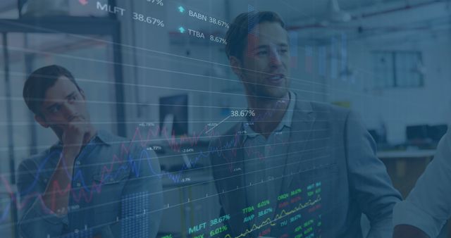 Business Professionals Analyzing Financial Data on Transparent Display - Download Free Stock Images Pikwizard.com