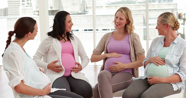 Group of Pregnant Women in Prenatal Class Bonding and Smiling - Download Free Stock Images Pikwizard.com