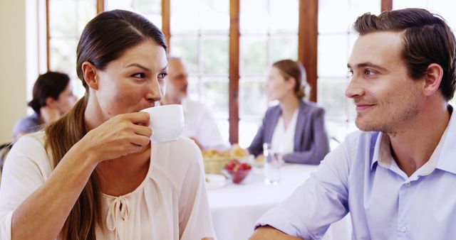 Business colleagues enjoying casual coffee break in bright cafe - Download Free Stock Images Pikwizard.com