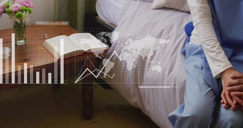 Senior patient sitting on bed clasping hands with medical hud overlay and open book