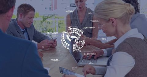 Business team analyzing digital dashboard with HUD analytics during collaborative meeting