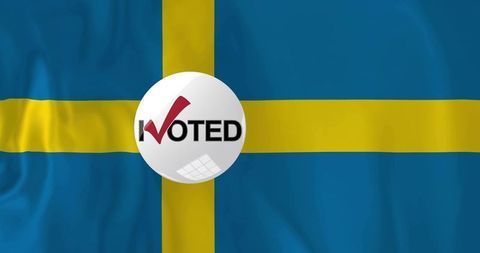 Swedish flag showing i voted sticker centered on yellow cross with red checkmark