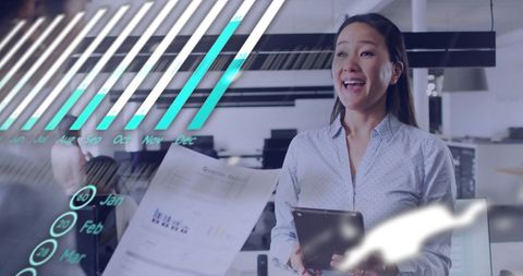 Diverse colleagues discussing financial reports in modern office