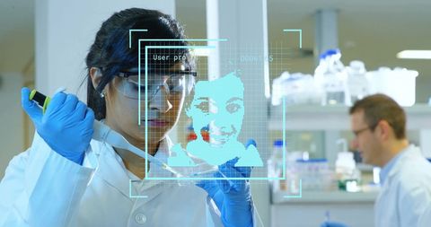 Bi-Racial Female Scientist Analyzing Samples with Digital Interface in Lab - Download Free Stock Images Pikwizard.com