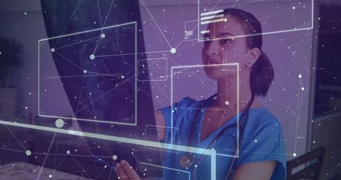 Indian doctor analyzing data on futuristic digital display in laboratory