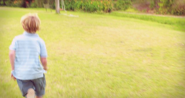 Blurred Motion of Boy Running on Grassy Field - Download Free Stock Images Pikwizard.com