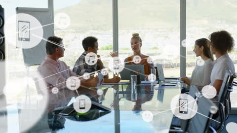 Diverse Business Team Collaborating with Digital Interfaces