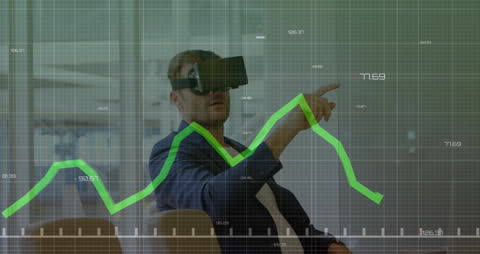 Businessman Using Virtual Reality for Financial Data Analysis