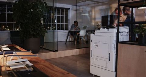 Overtime collaboration with office equipment late night teamwork