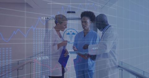 Medical Professionals Discussing Analytics in Hospital