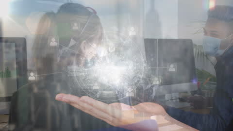 Hand Holding Digital Globe with Business Data Overlay