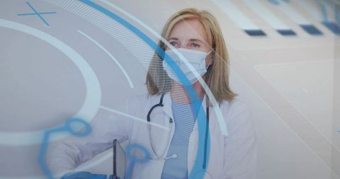 Mature female doctor reviewing tablet with augmented HUD overlay for telemedicine diagnostics