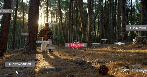 Kneeling hunter handling scoped rifle with digital overlays in sunlit pine forest
