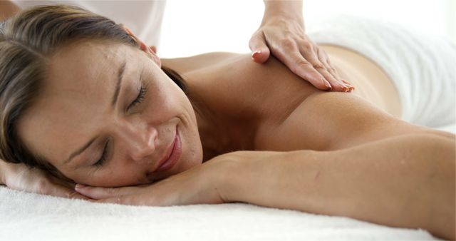 Woman Relaxing During Therapeutic Full Body Massage Session - Download Free Stock Images Pikwizard.com