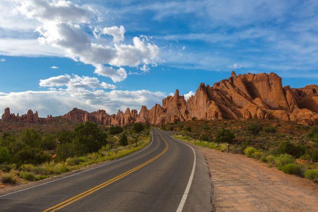 Scenic Winding Road through Colorful Red Rock Desert Landscape - Download Free Stock Photos Pikwizard.com