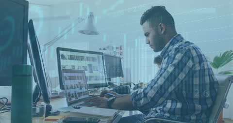 Businessman Analyzing Financial Data at Office Desk