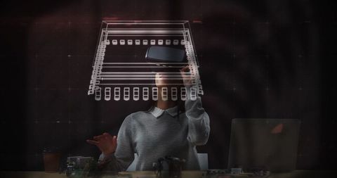 Engineer using augmented reality technology to design circuit schematics