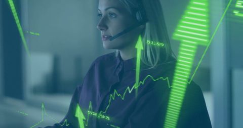 Woman with headset analyzing financial charts in modern office