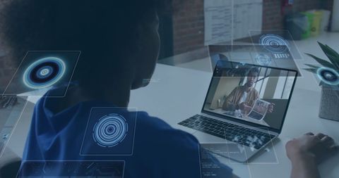 Woman participating in virtual meeting with futuristic interface