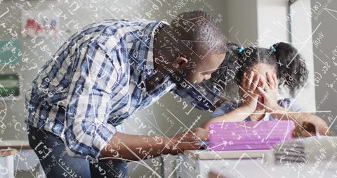 Teacher Mentoring Young Student with Math Concepts Overlay