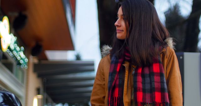 Woman in Plaid Scarf Enjoying Winter Evening Outdoors - Download Free Stock Images Pikwizard.com