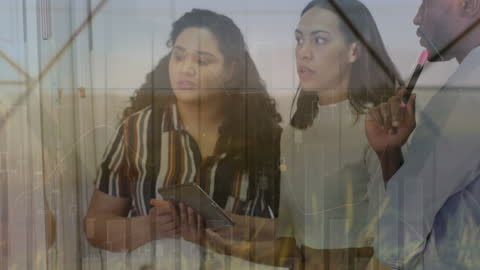 Collaborative Business Strategy Meeting with Financial Data Overlay