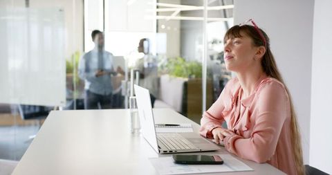 Businesswoman Contemplating at Bright Modern Workspace - Download Free Stock Images Pikwizard.com