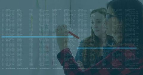 Women Collaborating in Modern Technology Meeting with Data Overlays