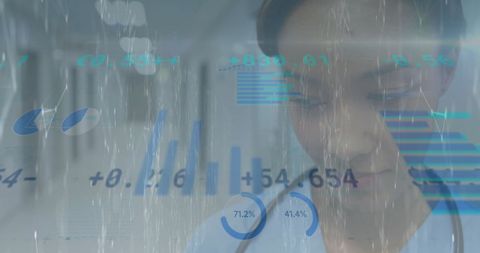 Biracial Female Doctor Analyzing Digital Financial Data in Hospital