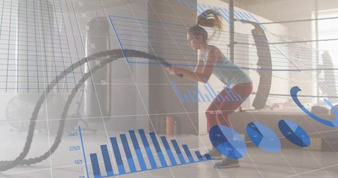 Female athlete swinging battle ropes with fitness analytics overlay strength conditioning