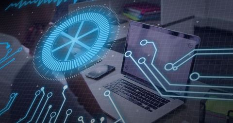 Open Laptop Displaying Holographic Circuit HUD Overlay on Modern Desk for Cybersecurity