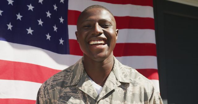 Smiling Air Force Soldier Standing in Front of American Flag - Download Free Stock Images Pikwizard.com