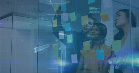 Team brainstorming with sticky notes on glass wall and digital data overlay for planning