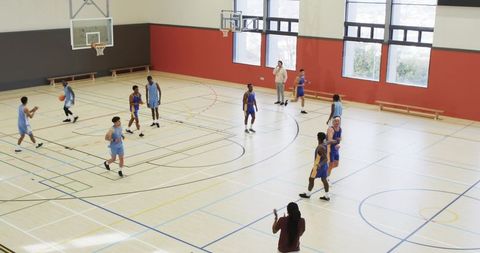 High School Basketball Practice in Modern Gymnasium