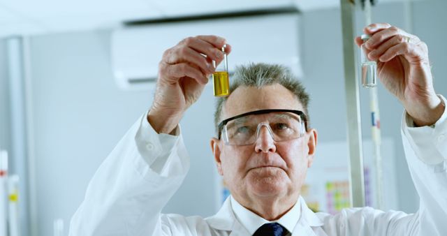 Senior Scientist Analyzing Chemical Samples in Laboratory - Download Free Stock Images Pikwizard.com